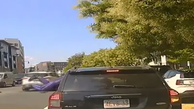 WATCH: Video shows trooper hanging out car window before arresting city worker on weapons charges