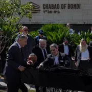 Suspect in Bondi Beach Killings Is Charged With Murder and Terrorism